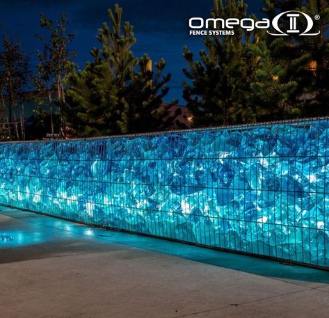 One of the panels we have been selling for years, the Evolution, has been used to create new additions to the family of offerings – our Gabion Fencing. We consider our customers, specifiers and installers a part of our family as well and welcome any new ideas! Gabion Wall Design, Gabion Retaining Wall, Fire Lighting, Gabion Fence, Decorative Fence, Water Feature Wall, Wall Fires, Natural Fence, Fence Doors