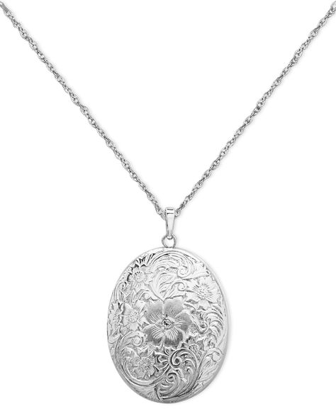 The perfect compartment for four of your favorite photos! This timeless locket features a sterling silver setting and engraved floral surface. Approximate length: 18 inches. Approximate drop: 1 inch. Sterling Silver Locket Necklace, Silver Locket Necklace, Engraved Locket, Photo Locket Necklace, Sterling Silver Locket, Silver Locket, Jewelry Lockets, Photo Locket, Ruby Jewelry