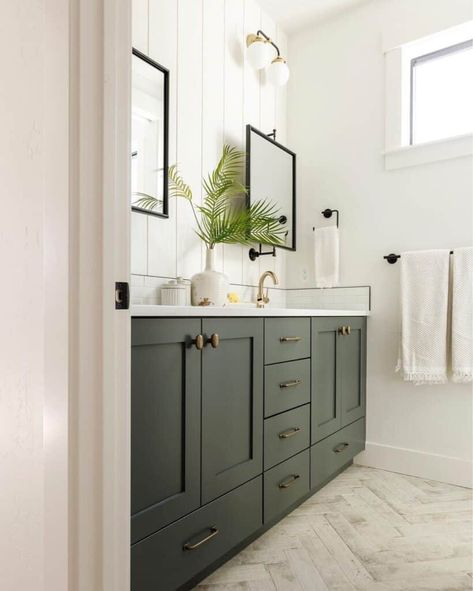 Herringbone Tile Floor with Dark Green Vanity - Soul & Lane Black White And Dark Green Bathroom, Dark Green Vanity Bathroom Ideas, Green Tile Master Bath, Dark Green Vanity Bathroom, Dark Green Vanity, Dark Green Bathroom Vanity, Herringbone Tile Floor Bathroom, Bathroom Ideas Dark Green, White Herringbone Tile Floor