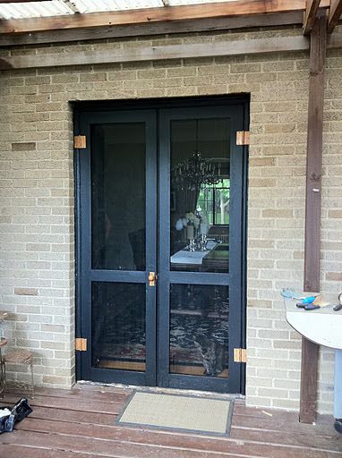 Diy Screen Door For French Doors, French Doors With Storm Doors, Screen French Doors, Double Front Door With Screen Doors, Bifold Screen Door Ideas, Screen Doors For French Doors, French Door Screen Doors, Screen Door For French Doors, Diy Old Windows Ideas