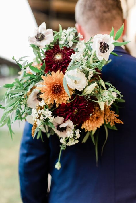 Weddings By Vogue Floral Design. Vogue Flowers Richmond, Virginia wedding florist. Textura bouquet. White Anemone, Burgundy Dahlia, Burnt Orange Disbud Dahlia, Orange Butterfly Ranunculus, White Lisianthus, Burgundy Astilbe, Golden Amaranth, White Orlaya, Feathered Eucalyptus, Gunni Eucalyptus, Italian Ruscus. The Jefferson. Laura Hoyles Photography. #weddingsbyvogue #vogueflowers #virginiawedding #virginiaweddingflorist #richmondwedding #autumnbouquet #bridalbouquet #uniqueflorals Burnt Orange Dahlia Bouquet, Orange Butterfly Ranunculus, Burgundy Astilbe, Dahlia Orange, Gunni Eucalyptus, Autumnal Bouquet, Deep Purple Wedding, Justin Johnson, Vogue Flowers