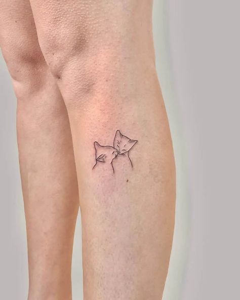 Cat Small Tattoo Ideas, Tasteful Cat Tattoos, Cat Inspired Tattoos Minimalist, Cat Tattoo On Leg, Two Cats Tattoo Ideas, Simple Kitty Tattoo, Two Cats Tattoo Outline, Small Dainty Cat Tattoos, Cat Tattoo 2 Cats