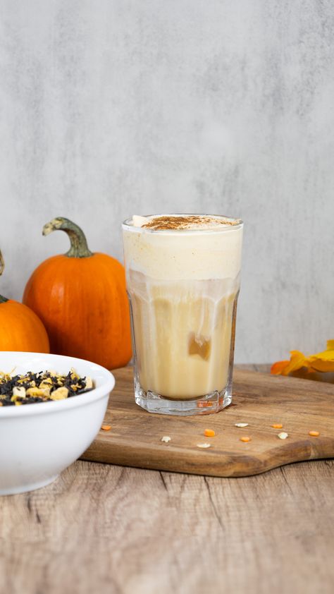 Iced Pumpkin Chai Latte on a brown cutting board, next to small pumpkins and loose-leaf Pumpkin Chai tea Copycat Starbucks Iced Pumpkin Cream Chai Tea Latte, Cold Foam Recipe, Chai Latte Starbucks, Pumpkin Chai Tea, Foam Recipe, Vegan Taco Salad, Iced Chai Latte, Tea Latte Recipe, Pumpkin Bread Pudding