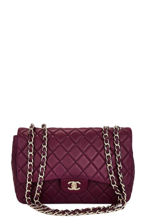 Find CHANEL Jumbo Classic Flap Bag on Editorialist. This Chanel Jumbo Classic Flap Bag features a quilted lambskin leather exterior with leather lining and gold-tone hardware. The bag has a turn lock closure, one main compartment, one interior flat pocket, one interior zip pocket, and one exterior flat pocket. The bag includes a serial card and measures approximately 11.5 inches wide, 8 inches high, and 3.5 inches deep. It has an adjustable shoulder strap with a 14-25 inch drop. The bag is in go Chanel Jumbo Flap, Chanel Jumbo, Classic Flap Bag, Flap Shoulder Bag, Purple Bags, Boot Bag, Dream Board, Classic Flap, Flap Bag