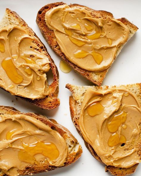 NYT Cooking on Instagram: “First, make @csaffitz's Sourdough Bread with the link in bio. Then slice it, cover it in peanut butter, drizzle with honey. That's it,…” Sandwich Specials, Hand Camera, Peanut Butter Drizzle, Bread Photography, Peanut Butter Brands, Hormel Recipes, Food Photography Tutorial, It Cover, Beautiful Food Photography