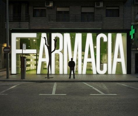 Freshome.  Clavel Arquitectos completed the impressive 180 square meter Casanueva Pharmacy in Murcia, Spain. Display Visual Merchandising, Window Signage, Retail Facade, Storefront Design, Exterior Signage, Pharmacy Design, Window Graphics, Shop Front Signage, Environmental Graphic Design