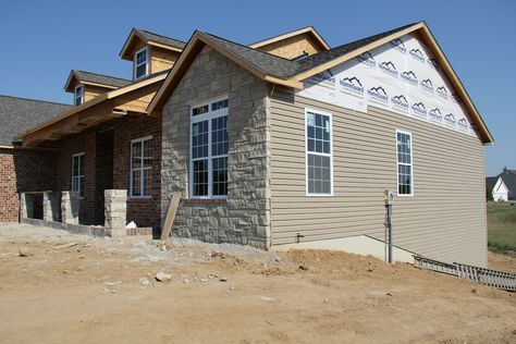 brick and stone veneer exterior home photos | For the siding we went with Mastic Siding in Pebblestone Clay. Exterior Brick Veneer, Brown Brick Houses, Stone Veneer Exterior, Roof Cladding, Brick Accent Walls, Brick Siding, Stone Exterior, House Design Exterior, Brick Stone