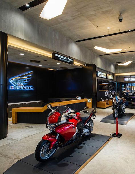 Honda BigWing | Whitesp-ce Interior Design Retail Store, Motorcycle Showroom Interior, Motorcycle Showroom Design, Signage Interior, Interior Design Retail, Honda Bike, Identity Graphic Design, Bike Prices, Wayfinding System