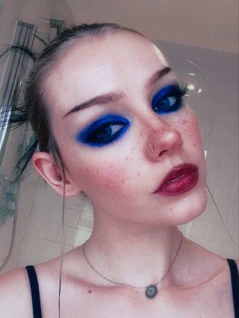 Funky Blue Makeup, Blue Face Makeup Looks, Alt Blue Makeup, Blue Trad Goth Makeup, Blue Alternative Makeup, Electric Blue Eye Makeup, Blue Witch Makeup, Black And Blue Makeup Looks, Blue Grunge Makeup