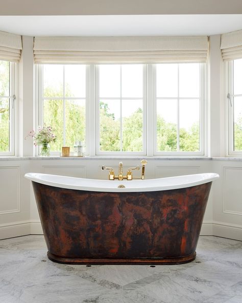 The Usk is a freestanding cast iron bath, its polished sheen and elegant lines adding luxury to any bathroom. Our designers have taken inspiration from the 18th Century Bateau ‘boat’ bath style and have created a tub with showstopping quality. Traditionally the Bateau bath was made in copper, so we offer a copper clad cast iron bath (The Copper Usk) and a Brass variant (The Brass Usk) in addition to our full range of finishes. Veranda Magazine, Expensive Decor, Cast Iron Bath, Cast Iron Bathtub, Country House Hotels, Bath Shower Mixer, Standing Bath, Herringbone Tile, Bathroom Goals