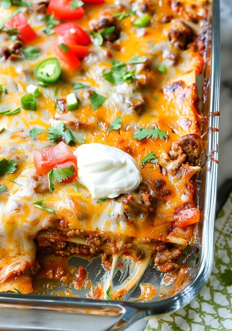 Dive into layers of flavor with this Cheesy Taco Lasagna Bake! Combining the zest of tacos with the comfort of lasagna, this dish is perfect for spicing up your dinner routine. It's loaded with lean ground beef, creamy ricotta, and plenty of cheddar, all seasoned with tasty taco spices. Ideal for a family meal or a festive gathering. Love it? Pin this recipe to your favorite board and share the joy of cooking with friends! Lasagna Taco, Baked Lasagna Recipe, Taco Spices, Mexican Lasagne, Bacon Lasagna, Lasagna Bake, Taco Lasagna Recipe, Ground Chicken Tacos, Cooking With Friends