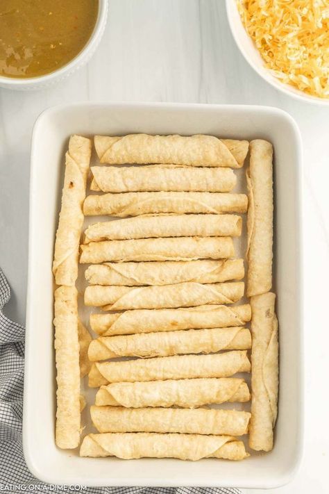 Taquitos With Enchilada Sauce, Oven Chicken Taquitos, Chicken Taquitos Enchilada Casserole, Taquito Enchiladas Frozen, Frozen Taquitos Enchiladas, Chicken Taquito Enchiladas, Chicken Taquito Enchilada Casserole, Pioneer Woman Taquito Enchiladas, Frozen Taquito Enchilada Casserole