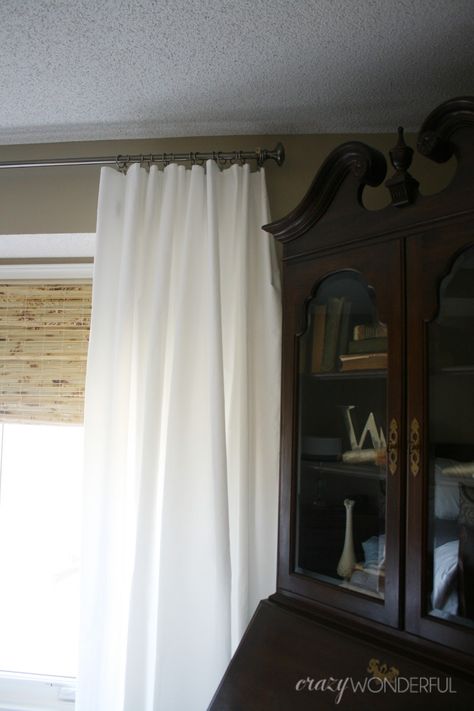 I’ve been plucking away at my bedroom lately, and have been eager to show you guys my crazy cheap solution for new curtains. Queen size sheets. The group of windows in our bedroom are wide and on the taller side.  The last curtains I had up were 54 inches wide and didn’t come close to … Curtains Behind Bed, Sheet Curtains, French Curtains, Queen Size Sheets, Cheap Curtains, No Sew Curtains, Simple Curtains, Pink Curtains, Long Curtains