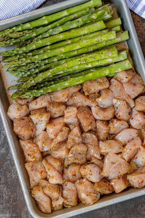 Lemon Garlic Butter Chicken Bites with Asparagus - #baked #chicken #recipe #asparagus #eatwell101 - The chicken bites are so juicy, tender, and delicious you’ll eat them hot right off the sheet pan! CLICK HERE to Get the Recipe - #recipe by #eatwell101® Sheet Pan Chicken Potatoes Asparagus, Chicken And Asparagus One Pan Meal, Lemon Garlic Butter Chicken Baked With Asparagus, Baked Chicken Asparagus, One Pan Chicken Asparagus, Chicken Tenders And Asparagus Recipes, Health Dinner Sides, Chicken Tender Sheet Pan Recipes, Chicken Recipes With Asparagus