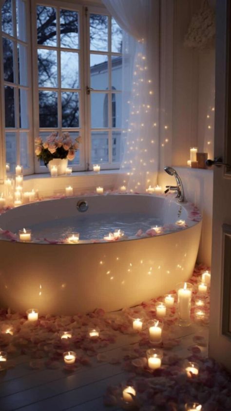 For busy couples looking for a sweet escape without leaving home, a romantic bath ticks all the boxes. It’s quick to set up, taking less than 15 minutes, and won’t break the bank. It’s perfect Romantic Settings At Home, Bathtub Couple Romantic, Rose Petal Bath Romantic, Romantic Bubble Bath Ideas Couple, Romantic Bathroom Ideas Couples, Honeymoon Room Romantic, Romantic Bath Ideas For Couples, Romantic House Decor, Jacuzzi Date