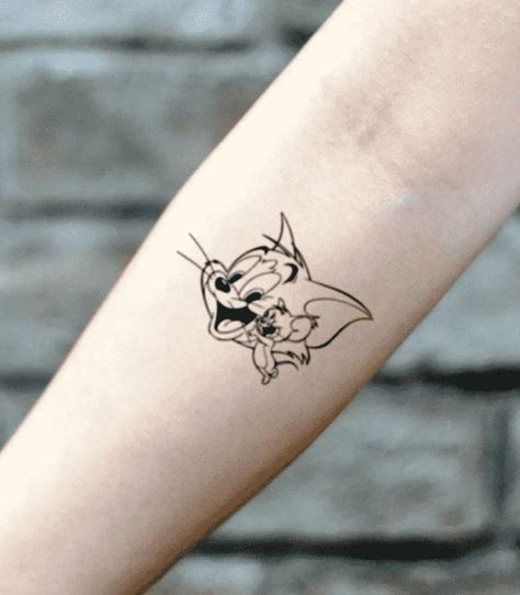 Tom and Jerry Tattoo Design Images (Tom and Jerry Ink Design Ideas) Small Tom And Jerry Tattoo, Tom N Jerry Tattoo, Tom Jerry Tattoo Design, Tom Tattoo Cat, Tom Y Jerry Tattoo, Tom And Jerry Tattoos, Tom And Jerry Tattoo Design, Jerry Tattoo Design, Tom And Jerry Tattoo Ideas