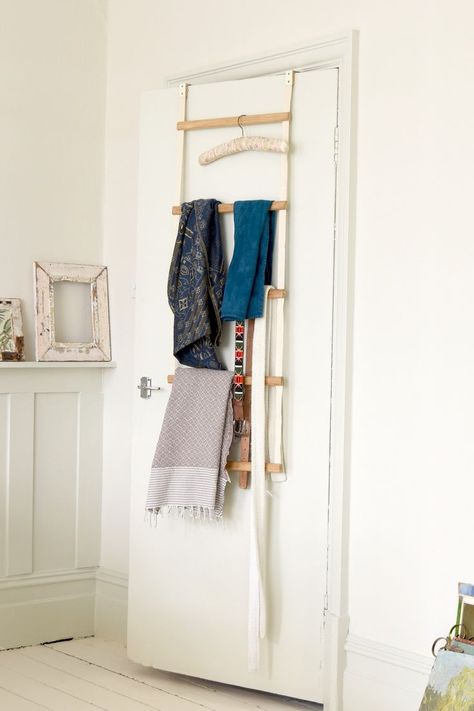 Make use of the space behind doors with this overdoor ladder to hang clothes, towels, or even house plants. It's perfect for small bedrooms – with zero floor space needed. Made from canvas and oak, this savvy saviour is the next rung up in stylish storage. #OverdoorStorage #OverdoorHangingOrganiser #BedroomOrganisation #BedroomStorage #BedroomIdeas #BedroomIdeasForSmallRooms #Bedroom #SmallSpaceLiving Tiny House Clothes Storage, Behind Door Storage, Bedroom Organisation, Folding Wardrobe, Hanging Ladder, Tidy Bedroom, Oak Console Table, Canvas Storage, Hanging Clothes