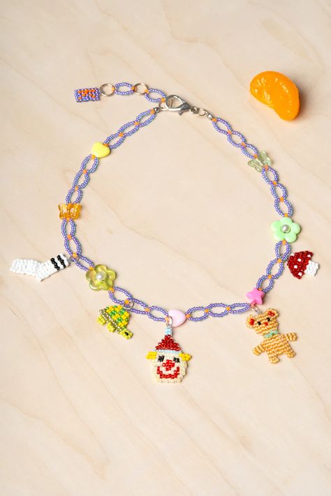 The Accessories – Pon The Store Seed Bead Charm Necklace, Tri Beads Crafts Projects, Beaded Charm Necklace, Bead Necklace Patterns, Beaded Miniatures, Clown Necklace, Beaded Objects, Beaded Square, Jewels Diy