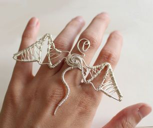 Wirework Dragon Ring Wire Dragon, Wire Wrapped Dragon, Free Jewellery Making Tutorials, Wire Jewelry Tutorial, Ring Tutorial, Dragon Ring, Dragon Jewelry, Beaded Crafts, Wire Rings