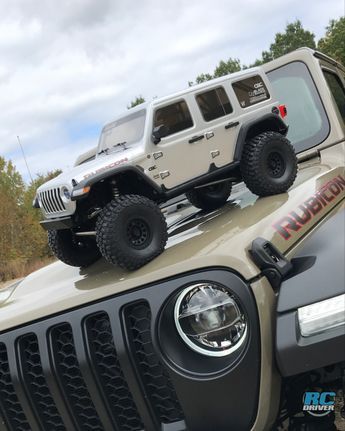 Finally we’re free to show you what’s been hiding in the RC Driver workshop and it’s been a difficult one to keep under wraps… literally! It’s the giant new Axial Racing SCX6 Jeep Wrangler Unlimited Rubicon! This beast is going to blow your mind with its massive size and capability. We have a first look of this rig posted on our website now with a link to our video review as well. Get all the details right here: https://www.rcdriver.com/axial-racing-scx6-jeep-wrangler-unlimited-rubicon-first-loo Jeep Wrangler Unlimited Rubicon, Wrangler Rubicon, Jeep Wrangler Rubicon, Wrangler Unlimited, Jeep Wrangler Unlimited, Blow Your Mind, Workbench, Jeep Wrangler, First Look