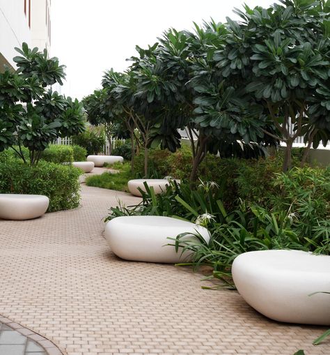 From #Paris to #Dubai to #Toronto the Galet
collection is our most popular concrete bench.
These seats, designed by #lescautarchitectures, are
composed of various different sizes and shapes that
suit and embellish a wide range of public space designs
#urbanarchitecture #urbanfurniture #urbandesign #architecture #concrete #benches #concretedesign #concretesolution #concretebenches
#concretestreetfurniture #landscapearchitecture #architecturalconcrete #custommade 
#concretebench #madeinbelgium Green Atrium, Public Garden Architecture, Public Garden Design, Concrete Benches, Hotel Landscape, Litter Bin, Public Space Design, Concrete Bench, Concrete Products