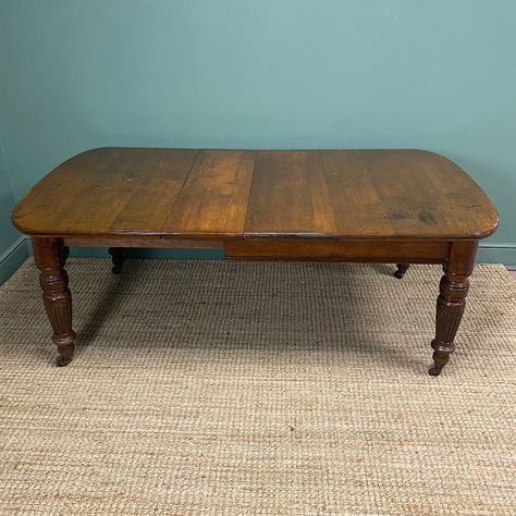 Dating from the late 19th century ca. 1880 this Golden Oak Victorian Antique Wind-Out Extending Dining Table has the benefit of extending. The top is made of solid oak which is beautifully figured, it has two central removable leaves along with moulded edges and rounded corners. The dining table comes complete with a winding handle and wind-out mechanism. It stands on wonderfully turned legs which sit on brown porcelain castors. Victorian Dining Table, Kidney Shaped Desk, Art Deco Paint, Antique Coffee Tables, Antique Tables, Antique Dining Tables, Extending Dining Table, Furniture Wax, Extending Table