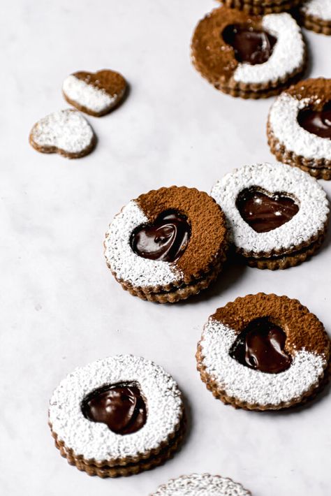 These chocolate espresso linzer cookies are delicate, buttery, crisp, and perfect for Valentine's Day! #linzercookies Chocolate Linzer Cookies Recipe, Chocolate Valentine Cookies, Chocolate Linzer Cookies, Linzer Tart Cookies, Valentine Baking, Xmas Cookies Recipes, Linzer Cookies Recipe, Valentines Cookies, Crazy Cookies