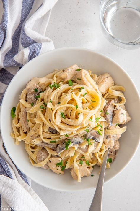 This easy dairy-free recipe for Fettuccine Alfredo with Chicken & Mushrooms is what pasta lovers' dreams are made of. Ready in 30 minutes, no cream or butter but as delicious and rich as a fancy restaurant meal. #pasta #alfredo #cleaneating #dairyfree #fettuccine Fettuccine Alfredo With Chicken, Pasta Alfredo Con Pollo, Alfredo With Chicken, Dairy Free Recipes Easy, Chicken And Mushrooms, Chicken Fettuccine Alfredo, Chicken Mushrooms, Dairy Free Pasta, Pasta Alfredo