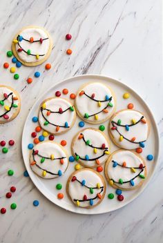 Best Christmas Cookies - 40+ of the most delicious and festive Christmas cookies for your holiday baking! Lots of easy and delicious homemade Christmas cookie ideas to make your next party or cookie exchange a success! Christmas Light Cookies, Light Cookies, Christmas Holiday Crafts, Crafts Christmas Gifts, Christmas Cookie Recipes Holiday, Cookie Stand, Best Christmas Desserts, Best Christmas Cookie Recipe, Christmas Cookie Recipes