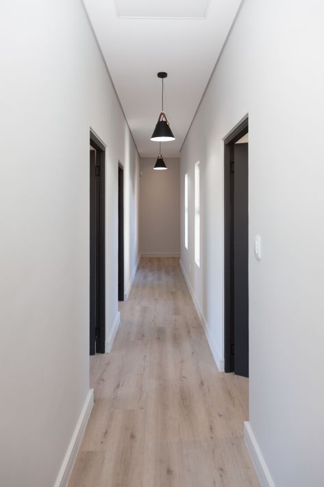 Passage Design Interiors, Grey Doors Interior Modern, Shadowline Ceiling, Black Door Frames, Hallway With Doors, Oak Vinyl Flooring, West Coast South Africa, Grey Interior Doors, Grey Painted Walls