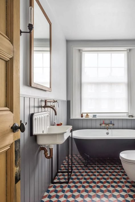 A rolltop tub from the Cast Iron Bath Co sits on custom-coloured encaustic tiles, and the walls are painted in a gentle grey Bad Inspiration, Bad Design, Main Bathroom, Family Bathroom, Bath Room, Vintage Bathroom, Traditional Bathroom, House Bathroom, Sink In