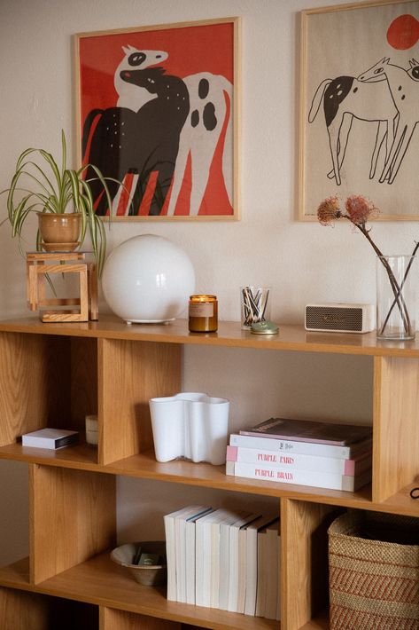 #bookshelf #candles #cozyhome #livingroom #livingroomdecor #interiordesign #interiors #midcentury #midcenturymodern Midcentury Bookshelf, Decorating My First Apartment, Book Shelf Decor, My First Home, Beautiful Bookshelf, Couch Styling, Room Bookshelf, Modern Bookshelf, Living Room Update