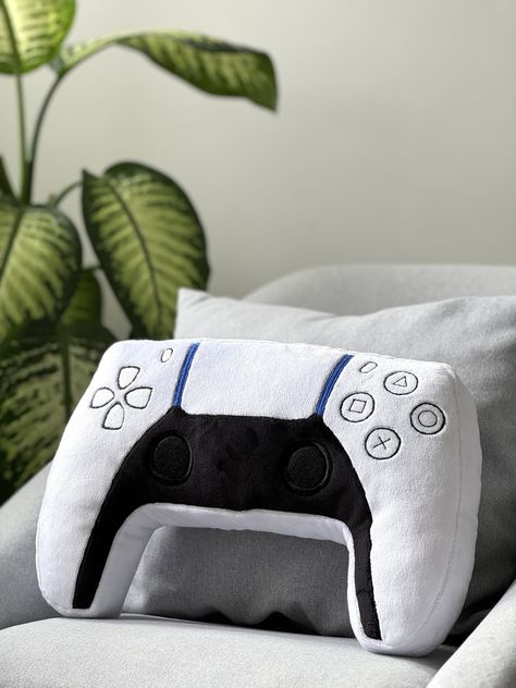 This game controller pillow is made of the softest minky fleece fabric. All front details are made of felt and embroidered around the edges. It's the perfect game room decor and makes a great gift for a gamer.  All you need to know:  FABRICS: * Soft minky fleece and felt for details.  * Stuffed with polyester fibers SIZE:  * Size in cm: 39 (the widest part) x26x7 * Size in inches: 15x10x2.75 QUALITY * Front details are sewed on.  * Each pillow is made to order. CARE * This pillow is washable. I Gaming Pillow, Video Game Room Decor, Boys Bedding, Video Game Room, Perfect Game, Game Room Decor, Kids Pillows, Gamer Gifts, Bedroom Themes