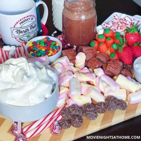 A Buddy the Elf Inspired Hot Chocolate Charcuterie Board is an easy and fun way to up your hot chocolate game! We filled ours with peppermint sticks, candy, chocolate, candy corn, and more!! It's sure to create some magical Christmas memories together! Movie Trivia Questions And Answers, Hot Chocolate Charcuterie Board, Hot Chocolate Charcuterie, Chocolate Charcuterie Board, Chocolate Charcuterie, Fall Cheese Boards, Movie Trivia Questions, Movie Trivia, Pumpkin Candy Corn