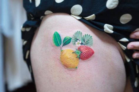 Lemon and strawberry tattoo on the right thigh. Zihee Tattoo, Strawberry Tattoos, Lemon Tattoo, Small Thigh Tattoos, Lemon And Strawberry, Strawberry Tattoo, Floral Tattoos, Fully Booked, Strawberry Lemon