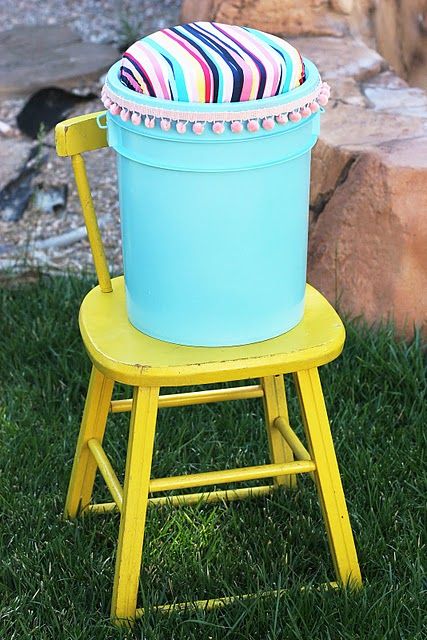 great idea.  esp. to keep on in the car.  these could also make cute seats for the kids new playroom. Campfire Chair, Campfire Chairs, The Terrible Two, Cheer Buckets, Storage Seat, Bucket Ideas, Bucket Seat Covers, Girl Scout Camping, Fishing Chair