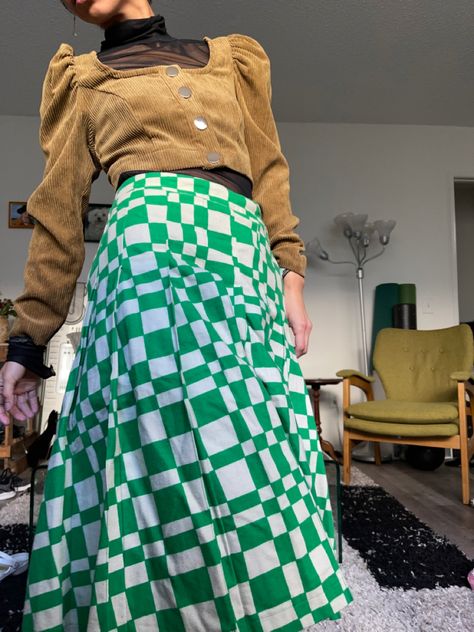 Stussy green checkered pleated skirt. Zara square neck brown top. Mesh black turtleneck. Green Check Skirt Outfit, Check Skirt Outfit, Checked Skirt Outfit, Stussy Women, Green Checkered, Check Skirt, Flowing Skirt, Brown Top, Black Turtleneck