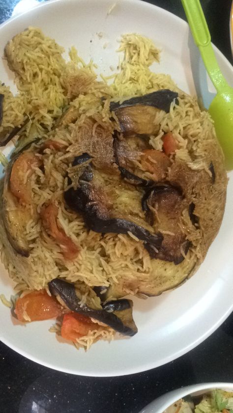 The yummiest arabic dish so far, i made it for my husband he is totally in love with it, its called up-side-down! & #magloobeh in arabic, Bring 2cups of Basmati #rice And 2meduim #Aborigine &1tomato, then fry the Aberdeen after slicing them thinly without peeling, then fry the chicken with cumin and salt, Then place the fried chicken at the bottom of ur pot, bring ur fried Aborigine, and slice a tomato above then make it boil with 2cups of water. Spice them with cumin, bpepper,salt,bazel leave Basmati Rice, In Arabic, Arabic Food, The Chicken, Aberdeen, I Made It, Fried Chicken, My Husband, Globe