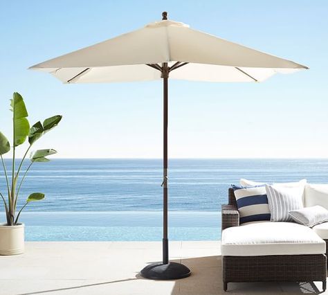 Sunbrella is the best choice for outdoor umbrellas since it last many years. We have owned our Sunbrella umbrella for 20 years and we love it. Pottery Barn Furniture, Sunbrella Umbrella, Large Patio Umbrellas, Umbrella Canopy, Market Umbrella, Outdoor Umbrella, Patio Umbrellas, Modern Garden, Beach Decor