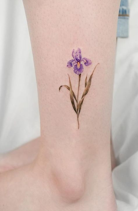 The Ultimate Guide To Flower Tattoos Iris Tattoo Color, Pressed Flower Tattoo, Simple Iris Tattoo, Purple Iris Tattoo, Flower Tattoos Meanings, Ballet Tattoo, Violet Flower Tattoo, Great Tattoo Ideas, Lily Tattoo Meaning