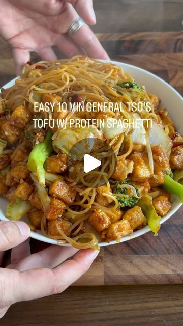 Kristopher K. on Instagram: "10 MIN GENERAL TSO’S TOFU W/ PROTEIN SPAGHETTI (a non authentic lazy/easy version) *non authentic because I used a premade sauce for time saving 😁

•

Ingredients:
Super firm tofu coated in corn starch 
Avocado oil spray
Lots and lots of garlic (I usually season my tofu but the garlic counteracts the blandness of tofu just fine haha)
Dry chilies 🌶️ 
General Tso’s sauce (premade)

Protein spaghetti:
Olive oil
@Barilla protein spaghetti 
Cabbage
Onions
Minced garlic
Mung bean sprouts 
Broccoli 
Drizzle of sesame oil 
A dash of general tso’s sauce
Mix well and serve

•" Protein Spaghetti, Firm Tofu, General Tso, Glass Noodles, Asian Noodles, Mung Bean, Bean Sprouts, Tofu Recipes, Tempeh