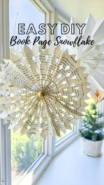 Amanda 🔨 Handmade On Poplar on Instagram: "My paper snowflake obsession continues! I love the mix of neutral textures and patterns hung together. This project may seem complicated at first, but I promise it’s quick and easy.  Supplies needed: loose book pages (4 per snowflake), hot glue gun, stapler, buttons, fishing line or string for hanging  Instructions: ❄️ Fanfold the book page, long ways. ❄️ Fold in half, unfold, and put a staple at the fold. ❄️ Refold and use hot glue to seal the two halves together. ❄️ Cut the outside end into a point; add some triangle cuts for snowflake details. ❄️ Repeat x 4. (Don't stress, cuts do NOT have to match in each section.) ❄️ Glue the 4 quarters together to make a circle. ❄️ Glue a button to the center for stability ❄️ Hang with fishing line or strin Book Page Snowflakes, Newspaper Snowflakes, Neutral Textures, Paper Snowflake, Book Paper, Paper Snowflakes, The Fold, Book Projects, Diy Book