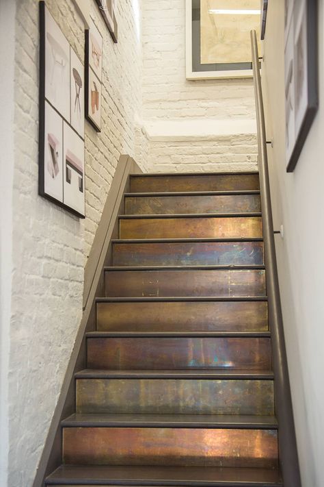 Patinated brass cladding industrial style corridor, hallway and stairs by rupert bevan ltd industrial | homify Basement Steps, Wood Stair Treads, Stair Walls, Painted Staircases, Diy Staircase, Stairs Makeover, Stair Wall, Escalier Design, Staircase Makeover