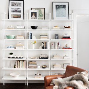 stairway white wall mounted bookshelf + Reviews | CB2. $297 incl. 15% discount Stylish Bedroom Design, Wall Mounted Bookshelves, Stylish Bedroom, Dressing Room Design, Ladder Bookcase, Outdoor Lounge, White Walls, Modern Interior, Bookshelves