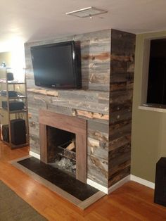 Reclaimed wood fireplace Chimney Ideas, Farmhouse Fireplace Ideas, Wooden Fireplace Surround, Wood Fireplace Surrounds, Reclaimed Wood Fireplace, Tv Over Fireplace, Fireplace Mantel Surrounds, Fireplace Pictures, Wooden Fireplace