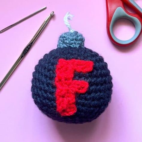 F Bomb Crochet Pattern - thecaffeinatedsnail.com Bomb Crochet Pattern Free, Dumpster Fire Crochet Pattern Free, Scrap Yarn Crochet Projects Ideas, F Bomb Crochet Pattern Free, Small Crochet Amigurumi Free Pattern, Crochet Stocking Stuffers, Geeky Crochet Patterns, Funny Crochet Gifts, Crochet Funny