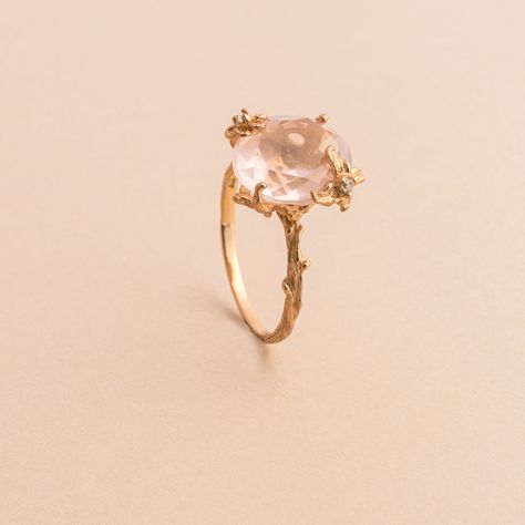 Say hello to our fan favorite! The delicate floral details on this ring surrounds the stunning oval cut rose quartz to set a statement you didn't know you needed. Approximate stone measurement: 3/8” x 1/2” Finish: 18k rose gold plated Material: sterling silver, genuine rose quartz gemstone Item #: 13056 FAIRPRICING $130 TOORIGINAL | $170 ESTIMATED RETAIL All of our items are priced specially while keeping the same high standard quality. Rose Quartz Flower Ring, Rose Quartz Wedding Ring Raw, Luxury Gold Rose Quartz Jewelry, Luxury Rose Gold Rose Quartz Jewelry, Cheap Rose Gold Round Crystal Ring, Rose Quartz Princess Cut Ring, Rose Gold Ring With Rose Quartz, Luxury Rose Gold Crystal Ring, Raw Rose Quartz Engagement Rings