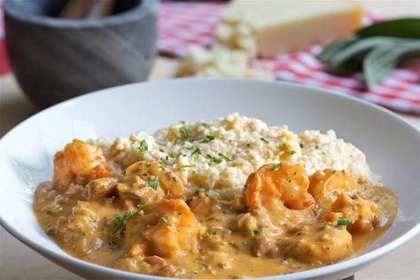 Shrimp-N-Grits - Harry's Restaurant Creamy Slaw, Basil Cream Sauce, Cattle Grazing, Cajun Shrimp And Grits, Staple Foods, Shrimp N Grits Recipe, Cajun Sausage, Crispy Fries, Shrimp Sauce