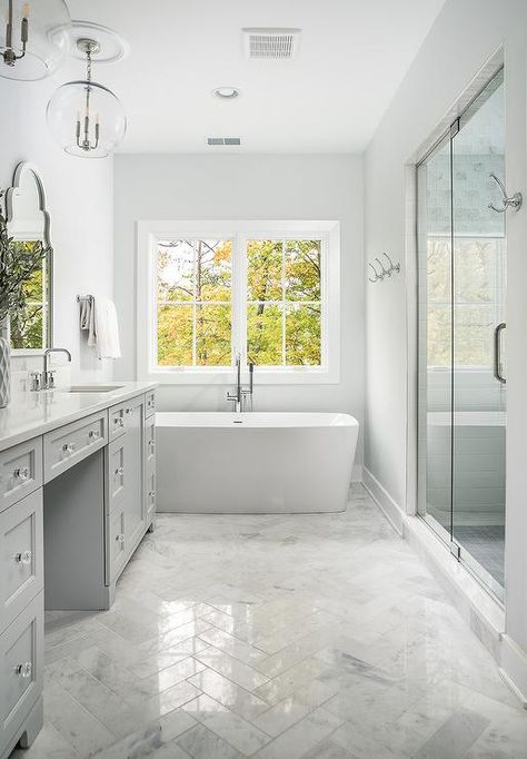 Polished marble herringbone bath floor tiles bringing dimension and sheen to a white and light gray bathroom design. Light Grey Bathrooms, Grey Bathrooms Designs, Marble Bathroom Floor, Best Kitchen Design, Bad Inspiration, Herringbone Floor, Trendy Bathroom, Bathroom Floor Tiles, Bathroom Layout