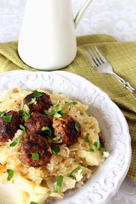 German Meatballs Over Mashed Potatoes & Sauerkraut Meatballs Over Mashed Potatoes, Potatoes And Sauerkraut, German Meatballs, German Side Dishes, Easy German Recipes, Meatball Dinner, Over Mashed Potatoes, Recipes Sausage, Sauerkraut Recipes